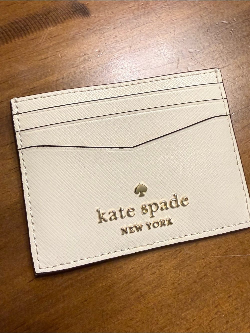 kate spade cream card case with gold logo - Picture 2 of 4